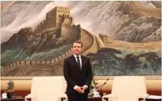  ?? AFP ?? French president Emmanuel Macron before the start of a meeting in Beijing yesterday