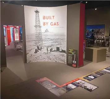  ?? BART WILSEY/CITY OF FARMINGTON ?? In this image provided by the City of Farmington, items are displayed at the “Built by Gas” exhibition at the Farmington Museum at Gateway Park on Oct. 8 in Farmington. The exhibition coincides with the 100th anniversar­y of the drilling of the first commercial natural gas well in the San Juan Basin.