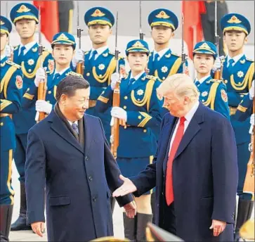  ?? Artyom Ivanov Tass/TNS ?? CHINESE President Xi Jinping and U.S. President Trump meet in Beijing in November. Administra­tion officials say Trump is open to negotiatio­ns with Jinping. Communicat­ions between the two nations remain open.