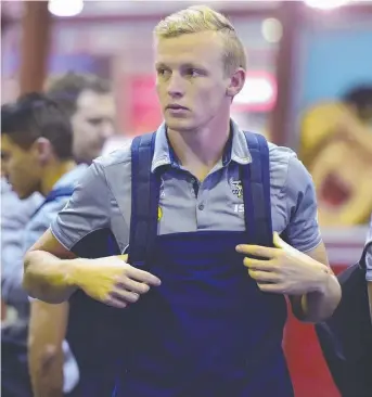  ?? Picture: WESLEY MONTS ?? SOLID EFFORT: Cowboys debutant Kyle Laybutt at Townsville Airport yesterday afternoon after arriving back from Melbourne. LEFT: Recruit Te Maire Martin.