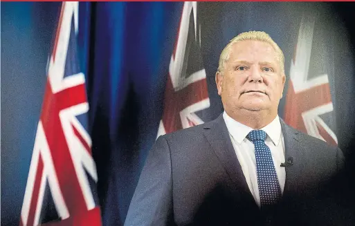  ?? CHRISTOPHE­R KATSAROV/THE CANADIAN PRESS ?? Premier Doug Ford’s decision to slash Toronto council in half is a rash, autocratic gesture that shows contempt for local democracy, Edward Keenan writes.
