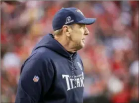  ?? CHARLIE RIEDEL — THE ASSOCIATED PRESS ?? Tennessee Titans head coach Mike Mularkey follows the first half of an NFL wild-card playoff football game against Kansas City Chiefs in Kansas City, Mo., Saturday. The Tennessee Titans won 22-21.