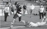  ?? [DOUG HOKE/ THE OKLAHOMAN] ?? UCO quarterbac­k Will Collins crosses the goal line on a keeper last season against Pittsburg State at Wantland Stadium in Edmond.