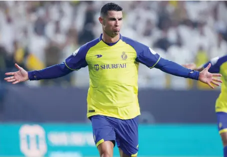  ?? AFP ?? Al-Nassr’s Portuguese forward Cristiano Ronaldo after scoring during their Saudi Pro League match against Al-Shabab in Riyadh last week.