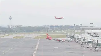  ?? — Bernama photo ?? In line with the expectatio­n of AAG grabbing more market share of MAS, the research team believed that it will have a positive impact to passenger traffic in klia2.