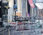  ?? [AP PHOTO] ?? Debris remains in the street from Saturday’s attack in Borough Market on Wednesday. London officials said a large part of the outer cordon of the crime scene had reopened. Borough Market, a popular gathering place, remains closed as more evidence is...