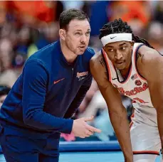  ?? Adrian Kraus/associated Press ?? Syracuse associate head coach Gerry Mcnamara, left, is the leading candidate to be Siena’s next men’s basketball coach, according to multiple sources.