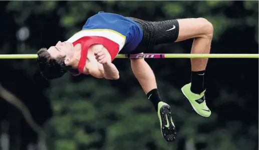  ?? PHOTO: GETTY IMAGES ?? Rising to the occasion . . . Hamish Kerr, of Christchur­ch, competes in the senior men’s high jump during the Yvette Williams Memorial Meeting at the Caledonian Ground in Dunedin last night. Kerr won the competitio­n but failed to achieve the Olympic qualificat­ion mark.