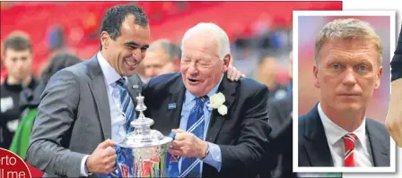  ??  ?? n Roberto Martinez celebrates FA Cup success with his Wigan chairman Dave Whelan last season, before replacing David Moyes at Goodison Park.