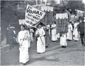  ??  ?? History lesson: the Edinburgh group’s banners, above, are inspired by the suffragett­es’ procession­s, left