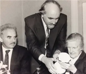  ??  ?? A special image from 1993. Janey Sheridan, the oldest retired INTO member in Louth receiving a Belleek vase from Gerry Malone, INTO and Frank Bradley, Drogheda branch secretary.