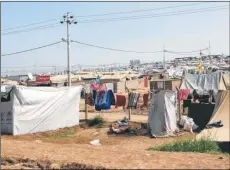  ?? Picture: Ashford Borough Council ?? Anne Forbes works has been awarded the Britsh Empire Medal and right, Domiz refugee camp in Kurdistan