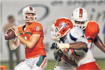  ?? ROBERT MAYER/ USA TODAY SPORTS PHOTO ?? UM backup quarterbac­k Ryan Williams got his chance to shine after replacing Stephen Morris in Saturday’s win over Savannah State. Williams completed 11- of- 13 passes for 176 yards and two touchdowns.