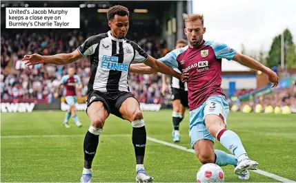  ?? ?? United’s Jacob Murphy keeps a close eye on Burnley’s Charlie Taylor