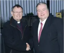  ??  ?? Archdeacon James Carroll with Cllr Paul Bell at the entrance at Cement Road where the new school will be built.