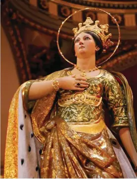  ??  ?? The polychrome statue of St. Catherine of Alexandria venerated in the parish church of Żurrieq by Mariano Gerada