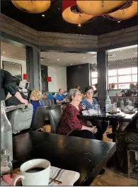  ?? Arkansas Democrat-Gazette/ERIC E. HARRISON ?? The marble-floored main room is one of three dining areas during brunch at Petit & Keet in west Little Rock.