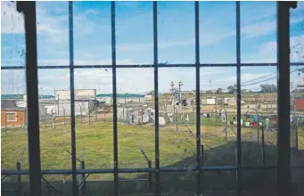  ?? Matilde Campodonic­o, The Associated Press ?? The yards of the Punta de Rieles prison can be seen from a prison window in Montevideo, Uruguay.