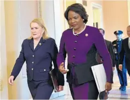 ?? MANDEL NGAN/GETTY-AFP ?? House impeachmen­t managers Rep. Val Demings, right, and Rep. Sylvia Garcia arrive for closing statements during the impeachmen­t trial of President Donald Trump.
