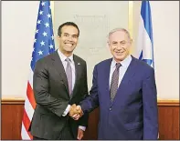  ??  ?? This Aug 15 photo provided by the Israel Ministry of Foreign Affairs shows Texas Land Commission­er George P. Bush posing with Israeli Prime Minister Benjamin Netanyahu in Jerusalem. (AP)