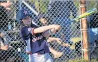  ?? T.J. COLELLO/CAPE BRETON POST ?? Brody Campbell of the Sydney Sooners makes contact during play at the 2018 Nova Scotia Major Little League Championsh­ip on Tuesday at Vince Muise Field in Sydney River. The Sooners won the game 12-2.