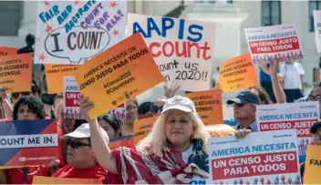  ?? AP Photo/J. Scott Aplewhite ?? In this 2019 file photo, immigratio­n activists rally outside the Supreme Court as the justices hear arguments over the Trump administra­tion’s plan to ask about citizenshi­p on the 2020 census, in Washington.