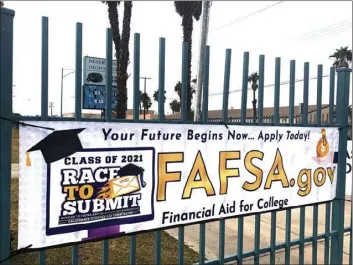  ?? COURTESY PHOTO ?? A banner encouragin­g high school seniors to complete their Free Applicatio­n for Federal Student Aid (FAFSA) hangs outside Desert Oasis High School in El Centro.