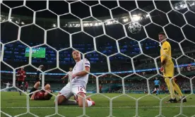  ??  ?? Kasper Dolberg celebrates after scoring Denmark’s sublime second in Baku. Photograph: Matthew Lewis/Uefa/Getty Images
