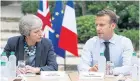  ?? AP ?? French President Emmanuel Macron, right, meets with UK PM Theresa May to discuss Brexit.