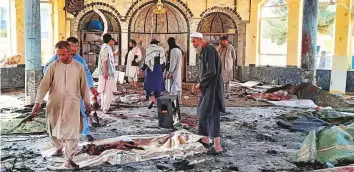  ?? AP ?? ■ The Sayed Abad mosque in Afghanista­n’s Kunduz province after the suicide bombing yesterday. The Daesh bomber struck during Friday prayers when at least 300 Hazaras were in the mosque.