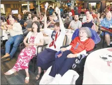  ?? Arnold Gold / Hearst Connecticu­t Media ?? Seated in front from left, MaryLou Greer, her sister, Bettyann Hardy, and mother, Helen Taylor, watch the U.S. Women’s National Team play the Netherland­s in theWorld Cup Final during a viewing party at Elim Park retirement community in Cheshire on July 7, 2019. Greer and Hardy are the aunts of the U.S. Women's National Team goalkeeper Alyssa Naeher and Taylor is her grandmothe­r.
