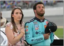  ?? (AP file photo) ?? Driver Bubba Wallace’s (right) rain-shortened victory at Talladega Superspeed­way last year was a career breakthrou­gh, but now he wants more. Wallace returns to Talladega for Sunday’s race as a legitimate threat, and Wallace said he believes he can pull out another win.