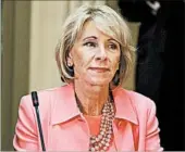  ?? EVAN VUCCI/AP ?? Education Secretary Betsy DeVos revoked former President Barack Obama’s attempt to reform collection­s.