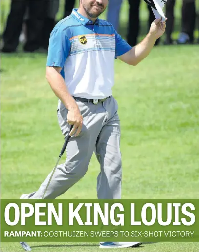  ?? Picture: Getty Images ?? RUNAWAY CHAMPION. South Africa’s Louis Oosthuizen doffs his cap to the fans on the 18th hole shortly before winning the South African Open at Randpark Golf Club yesterday.