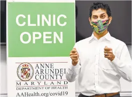  ?? JEFFREY F. BILL/ CAPITAL GAZETTE ?? Anne Arundel County Health Officer Dr. Nilesh Kalyanaram­an and the first responders will be among the first group in the county to be vaccinated.