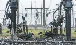  ?? BRENDAN HOFFMAN/THE NEW YORK TIMES ?? Nearly half of Ukraine’s energy grid has been knocked out by Russian missiles, including this substation in central Ukraine, struck in October.