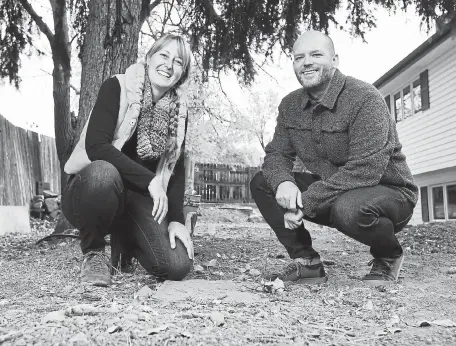  ?? Matthew Jonas, Daily Camera ?? From left, Gabi and Ian Scott are pictured near the spot where Ian found the ring that belonged to the previous homeowner at their home in Longmont on Wednesday.