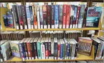  ??  ?? Books stand on the shelves of the remodeled Rathbun branch library in Oildale.