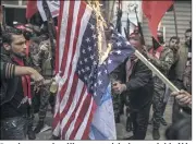  ?? (Photo MaxPPP) ?? Des drapeaux israéliens et américains ont été brûlés
