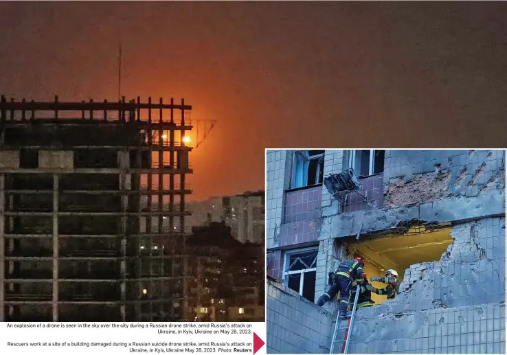  ?? Reuters ?? An explosion of a drone is seen in the sky over the city during a Russian drone strike, amid Russia’s attack on Ukraine, in Kyiv, Ukraine on May 28, 2023.
Rescuers work at a site of a building damaged during a Russian suicide drone strike, amid Russia’s attack on Ukraine, in Kyiv, Ukraine May 28, 2023 Photo: