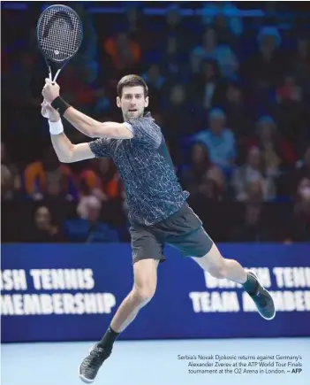  ?? — AFP ?? Serbia’s Novak Djokovic returns against Germany’s Alexander Zverev at the ATP World Tour Finals tournament at the O2 Arena in London.