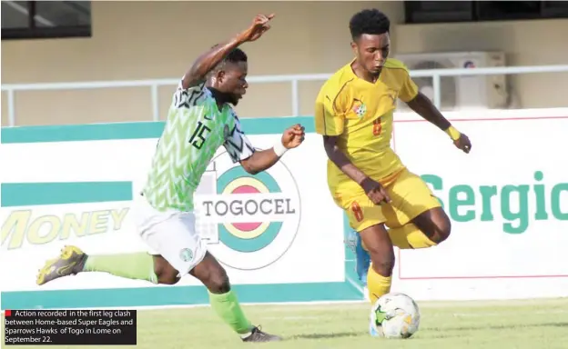  ??  ?? Action recorded in the first leg clash between Home-based Super Eagles and Sparrows Hawks of Togo in Lome on September 22.