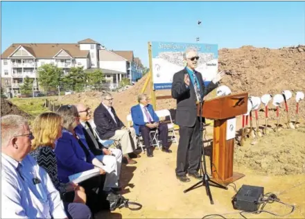  ?? DONNA ROVINS — DIGITAL FIRST MEDIA ?? Steve Kambic, Petra Community Housing director — speaks during Wednesday’s groundbrea­king ceremony for SteelTown Village in Phoenixvil­le. Constructi­on on the affordable housing rental community on Wheatland Street is expected to take about 12-months.