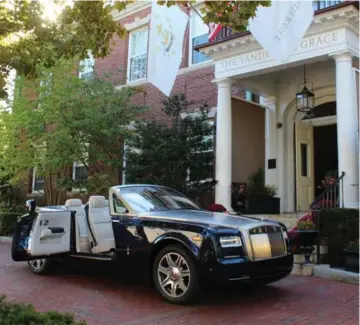  ?? PETER BLEAKNEY PHOTOS FOR THE TORONTO STAR ?? The Rolls-Royce Phantom coupe shows off its suicide doors in front of the Vanderbilt Grace Hotel in Newport, R.I.