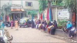  ??  ?? Parents wait outside a civic-run school to draw attention to the apathy towards their children under the RTE Act