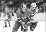  ?? Associated Press file photo ?? Guy Lafleur of the Montreal Canadiens cuts in front of the Devils’ Aaron Broten during a 1983 game in which Lafleur scored his 500th career goal.