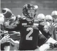  ?? Peter Mccabe / Canadian Press ?? Quarterbac­k Johnny Manziel was 12-of-20 passing for 88 yards and a touchdown in Hamilton’s 30-15 CFL preseason victory over Montreal.
