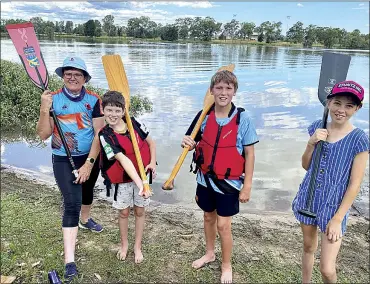  ?? PHOTO: NARRABRI COURIER ?? Onshore paddle instructio­n from Dubbo’s Trish Taylor for Beau Laws, Charlie Butler and Stella Laws.