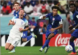  ?? ?? Harry Kane goes down under the challenge of USA’s Tyler Adams