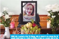  ??  ?? NGHE AN: A portrait of Bui Thi Nhung, who is feared to be among the 39 people found dead in a truck in Britain, is kept on a prayer altar at her house in Vietnam’s Nghe An province yesterday. —AFP